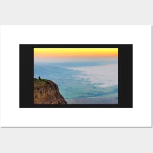 Man meditating at sunrise on Mam Tor, Castleton, Derbyshire,UK Posters and Art